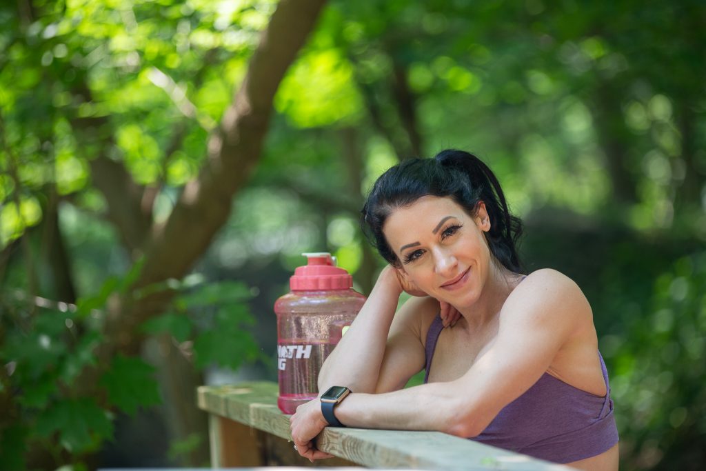 Gina Switzeny demonstrating a dumbbell exercise